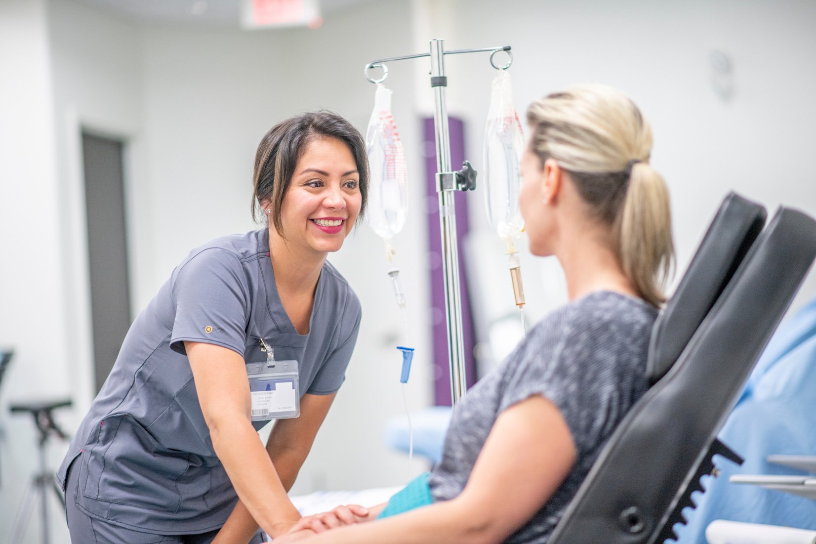 Women receives IV drip treatment